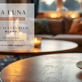 La Luna decaffeinated blend coffee package with a steaming cup of coffee on a table in a cozy living room.